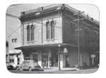  I.O.O.F. building in 1884 following the fire - The corner caf(now Bud's) was started by Tom Wong in 1944 - to the left is Dixon Home Bakery, Seifert family proprietors - later the Cross family. Far left is the Dixon tribune office, Fred Dunnicliff, editor